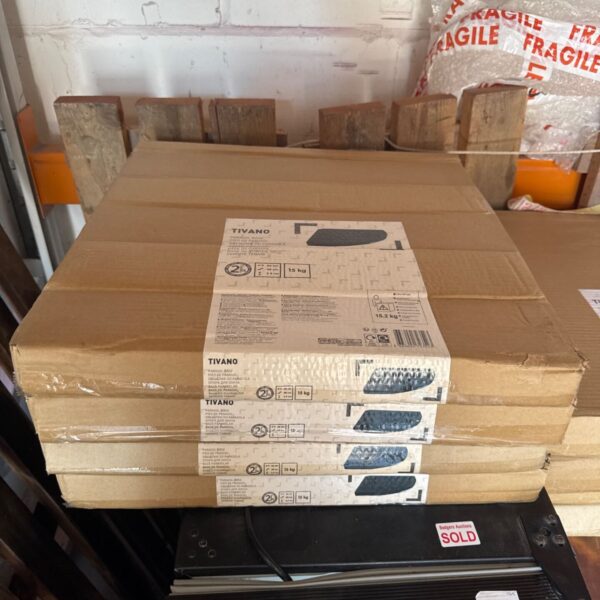 Set of four Tivano 15kg parasol bases in packaging.