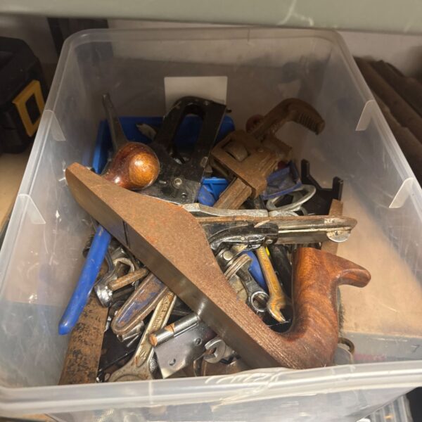 Vintage tool lot with wood plane and Stilson grips.