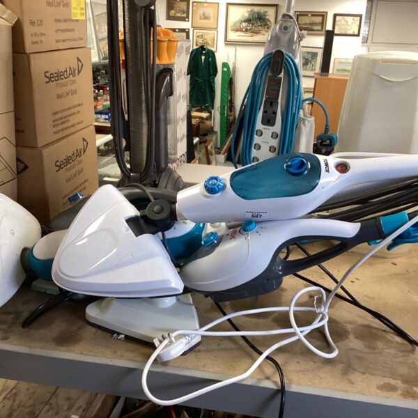 Tower steam mop from a lot of five cleaning appliances.