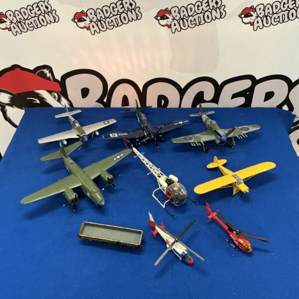 Vintage toy model planes and helicopters collection for collectors.