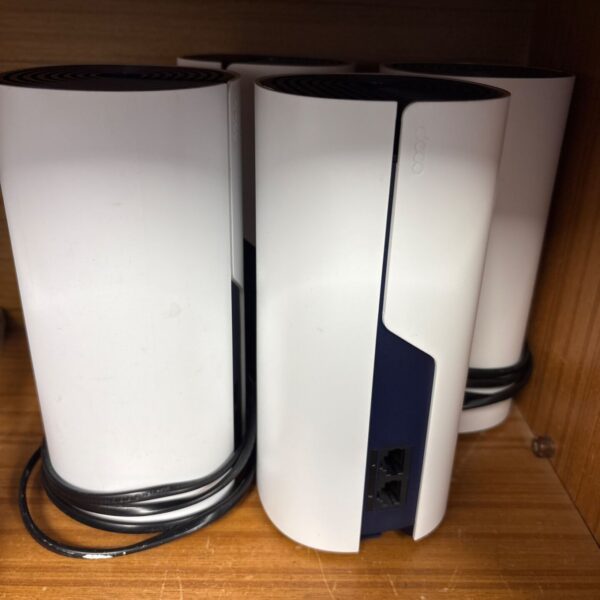 White TP-Link Deco mesh WiFi system for home networking.
