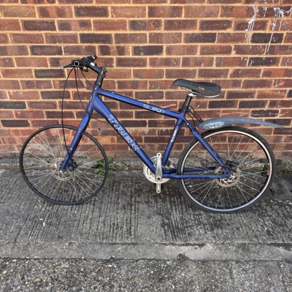 Blue Trek SU200 road bike offered for repair.