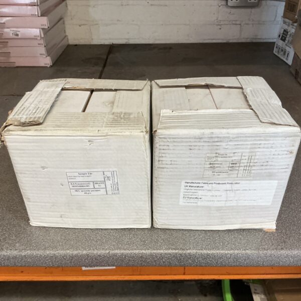 Two boxes of Trentie white 10x20 tiles with some wear.