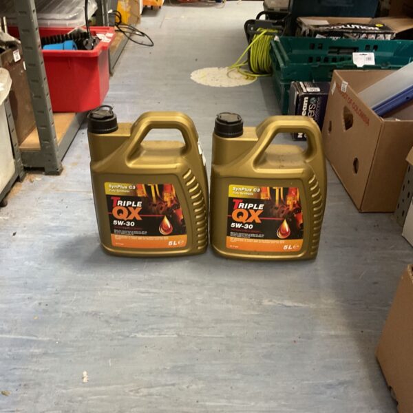 Two 5L bottles of Triple QX 5W-30 fully synthetic engine oil.