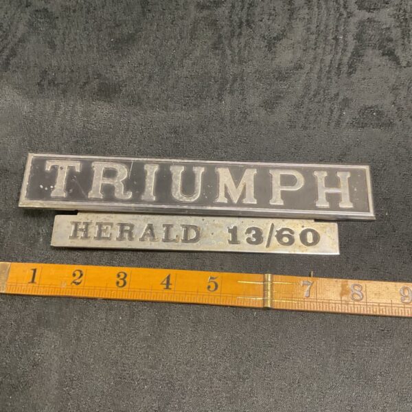 Vintage Triumph Herald 13/60 car badge for collectors.