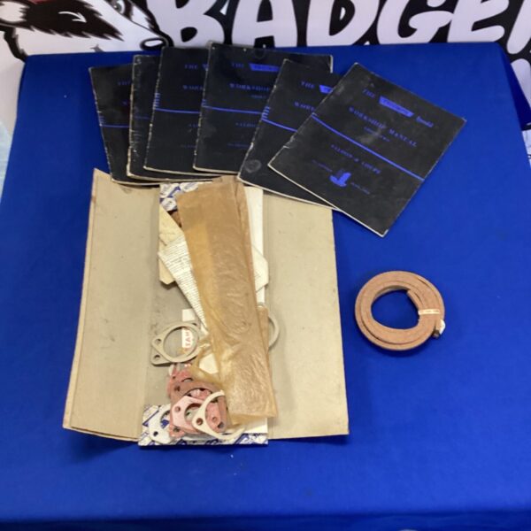 Triumph Herald workshop manuals and gasket set for classic car repair.