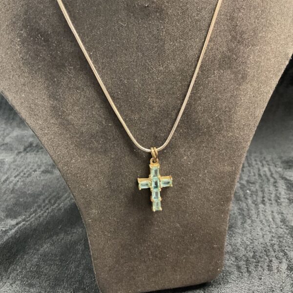 Turquoise and 925 silver cross necklace on a snakelink chain.