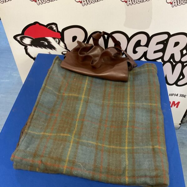 Tweedmill picnic blanket with a classic tartan pattern and carry bag.