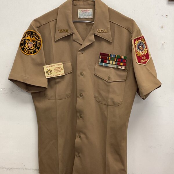 US Navy Veterans uniform shirt with patches and name tag.