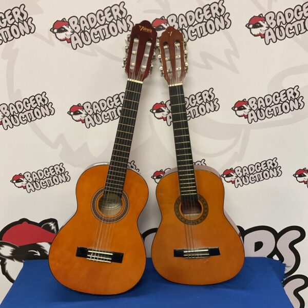 Pair of used Valencia children’s acoustic guitars for beginners.