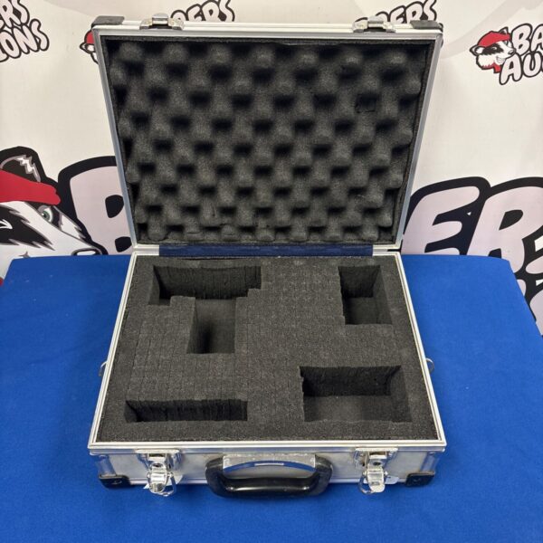 Open Vanguard aluminium flight case with foam inserts.