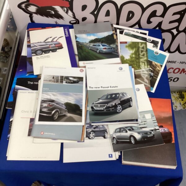 Vintage Vauxhall Vectra car brochures, 1990s automotive sales literature.