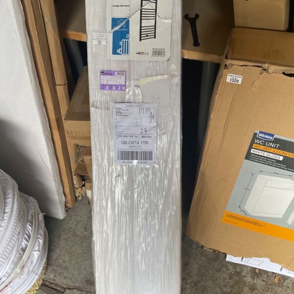 Matt black Verano 1200x300 towel rail heater in original packaging.