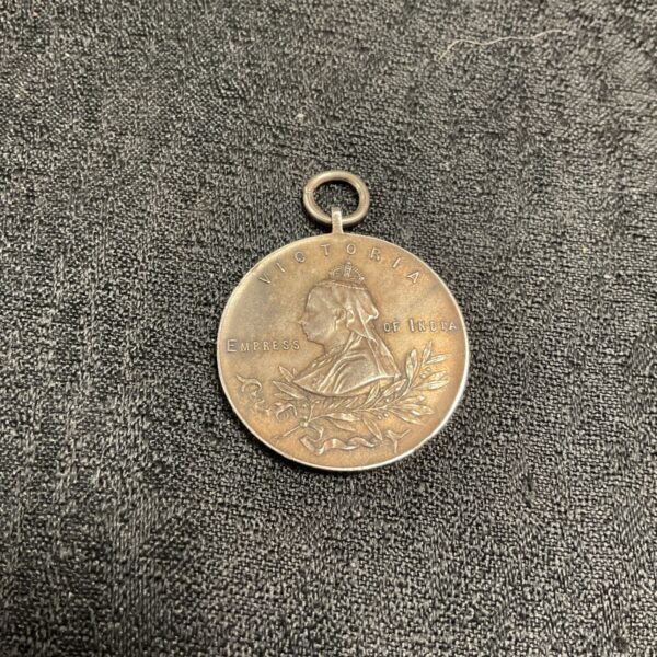 Antique Victoria temperance medal with Queen Victoria portrait.