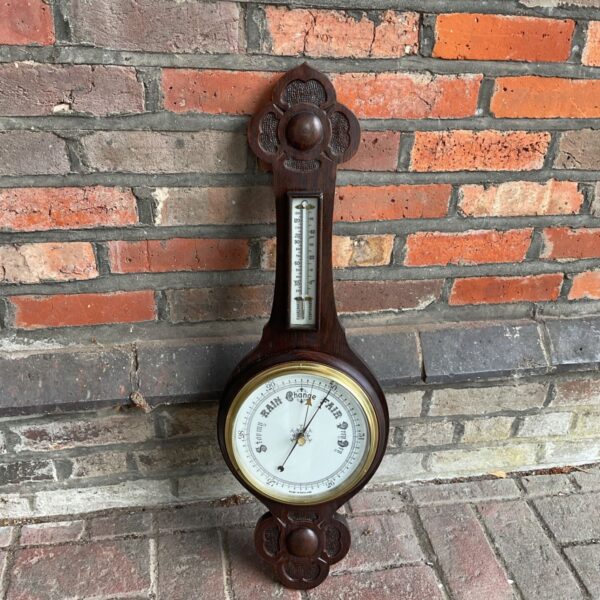 Antique Victorian mercury barometer in oak case.