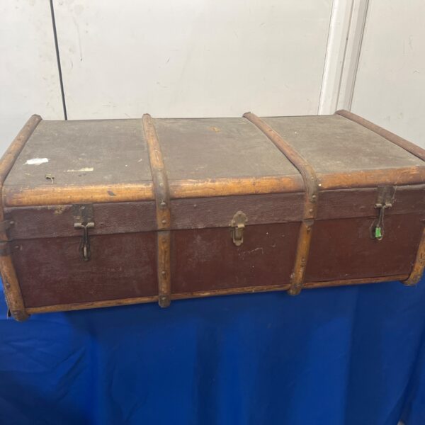 Antique Victorian steamer trunk with bentwood detailing.