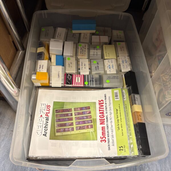 Vintage 35mm slides in protective sleeves, a nostalgic photograph collection.