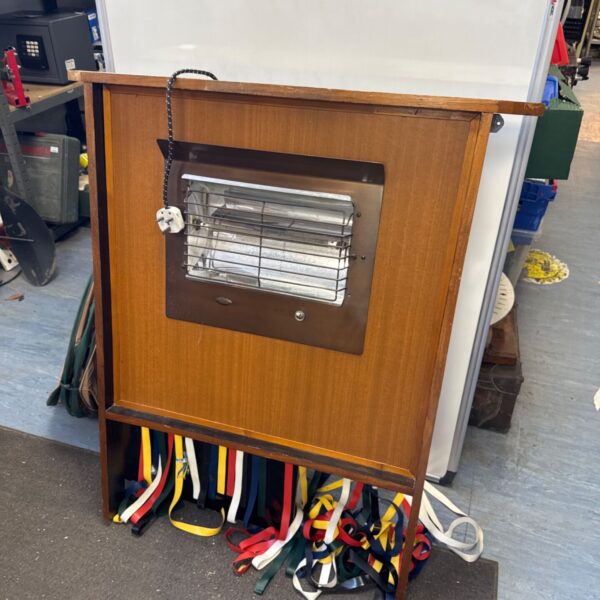 Vintage Belling electric heater with wooden surround and mesh guard.