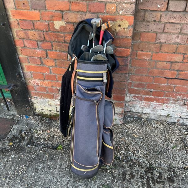 Vintage Bennington golf bag with clubs, a collectible sporting item.