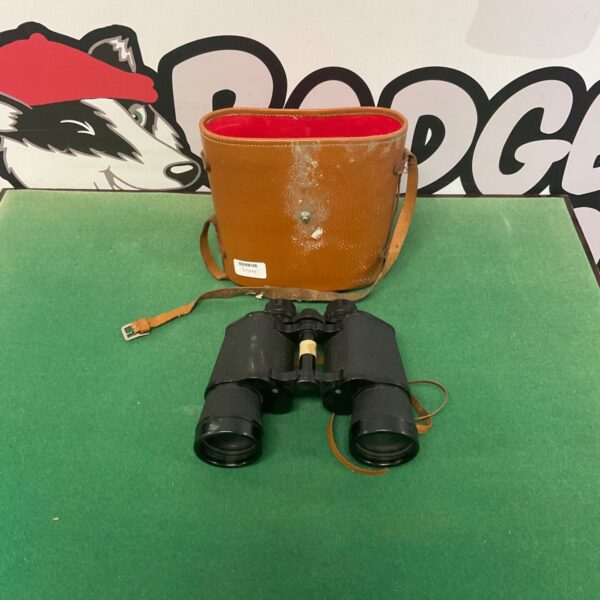 Vintage Dortro 10x50 binoculars with a worn leather case.