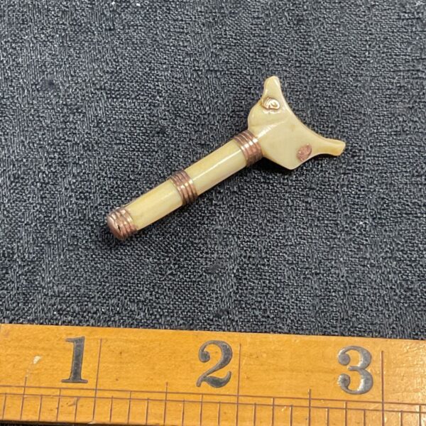 Vintage bone brooch with yellow metal mount, antique jewellery.