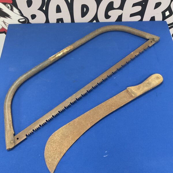 Vintage bowsaw and machete combination tool, antique garden equipment.