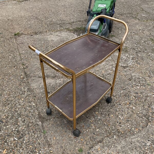 Vintage butlers trolley with three tiers and wooden frame.