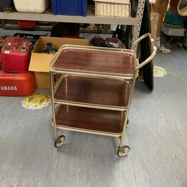 Vintage butlers trolley with faux wood tiers and brass frame.