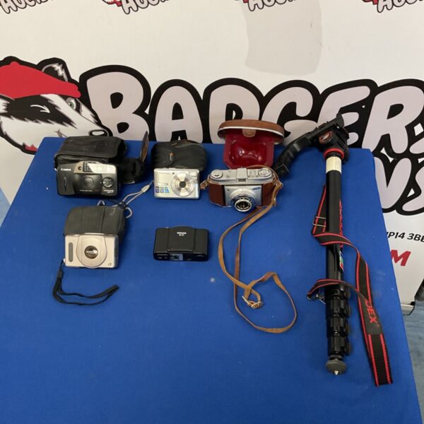 Vintage camera lot including Canon, Samsung, and Kodak cameras.