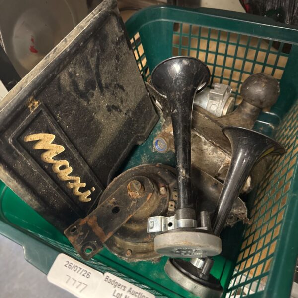 Vintage car horns and Maxi mud flaps for classic car restoration.