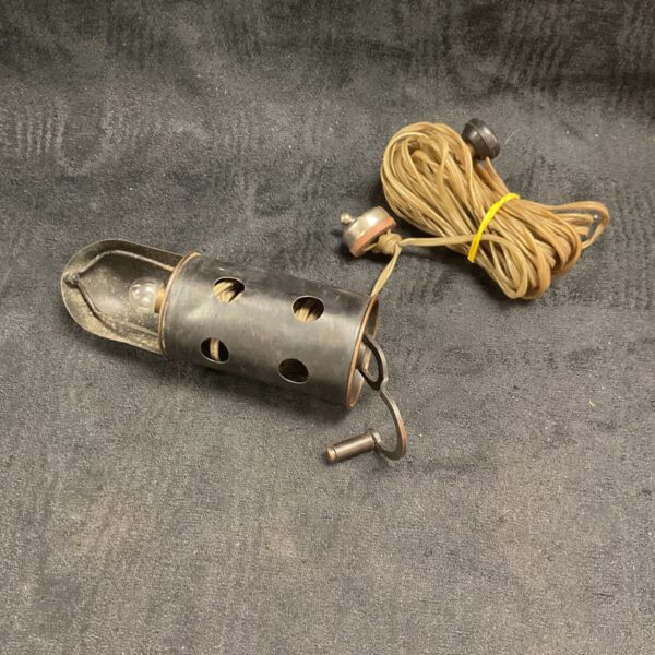 Vintage car inspection lamp MK2 with reel-in wire.
