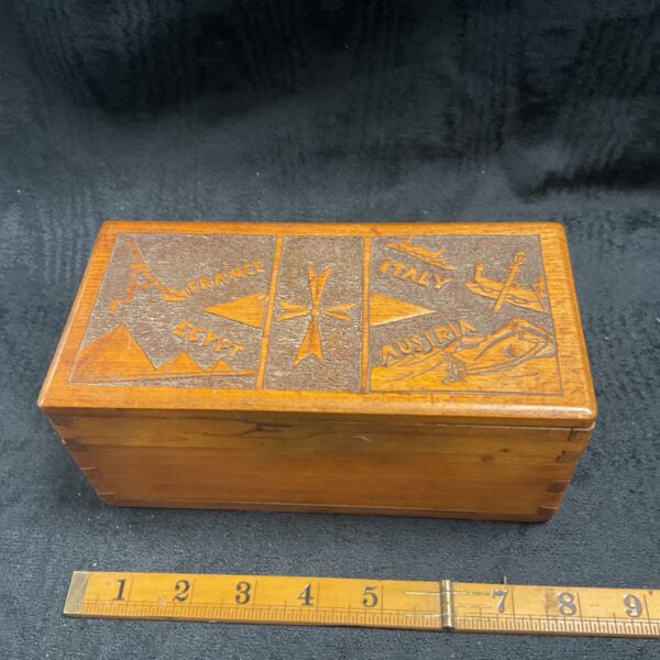 Vintage carved wooden box with Maltese cross and national motifs.
