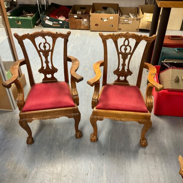 Pair of vintage red upholstered children’s arm chairs.