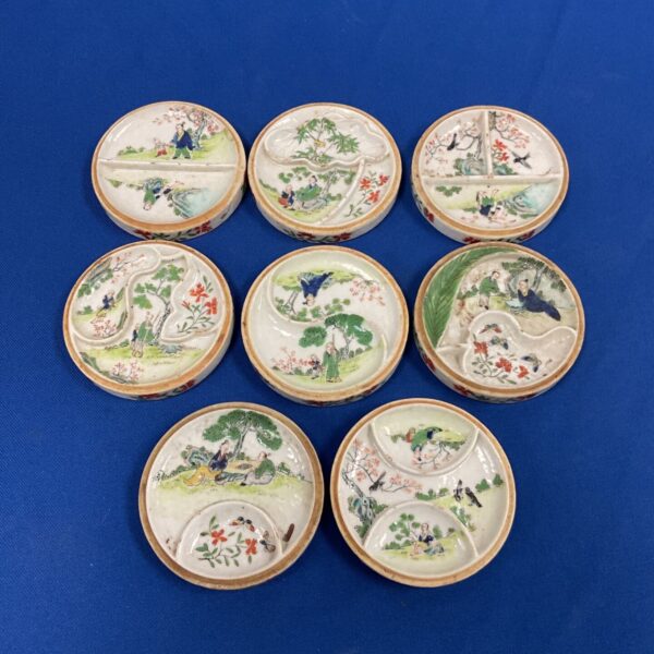 Vintage Chinese sauce dish with hand-painted bird design.