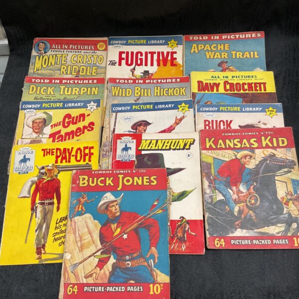 Vintage cowboy comics collection featuring colorful pulp comic book covers.