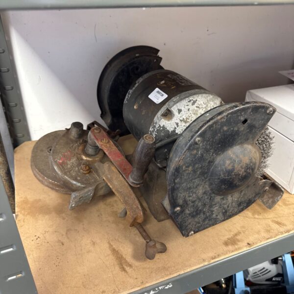Vintage electric bench wheel with manual hand wheel for pottery.