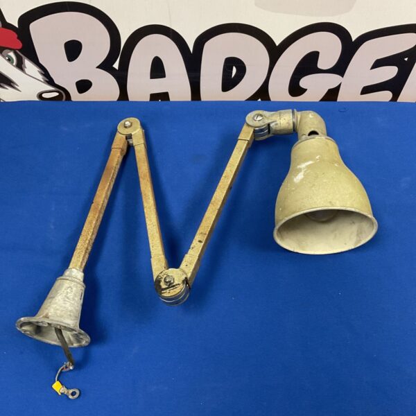 Vintage engineers lamp with adjustable arm and metal shade.