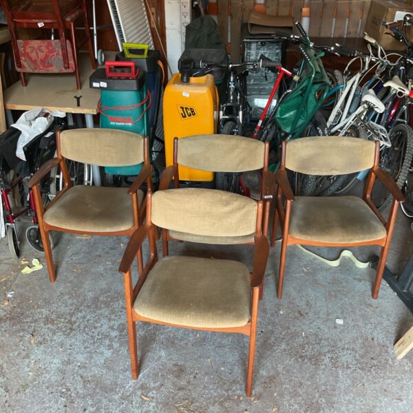 Set of four vintage Ercol chairs with upholstered seats.