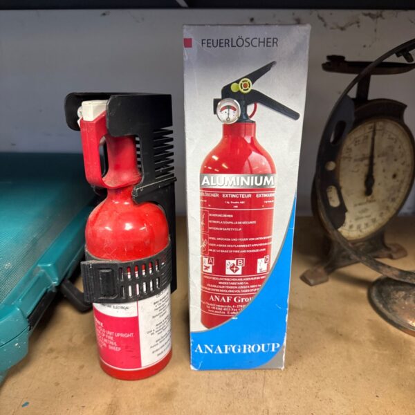 Vintage German aluminium fire extinguisher, collectible firefighting equipment.