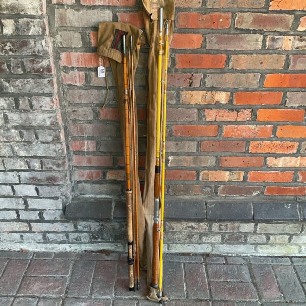 Vintage lot of split cane and fibreglass fishing rods for collectors.
