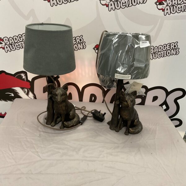 Pair of vintage fox table lamps with bronze figurines.