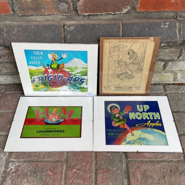 Vintage framed advertisement for Washington State apples with cartoon character.