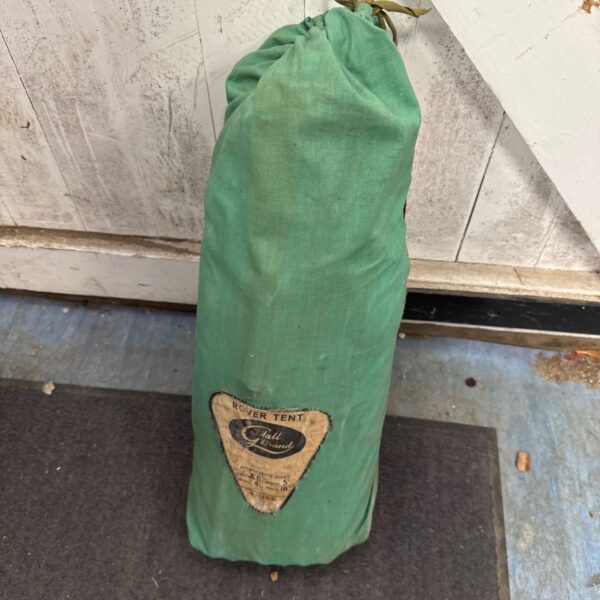 Vintage Goodall Rover tent rolled up and showing branding.