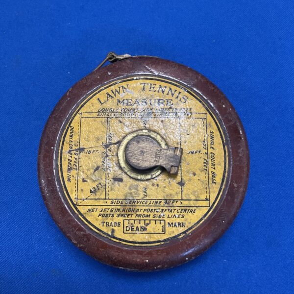 Vintage lawn tennis measuring tape in leather case.