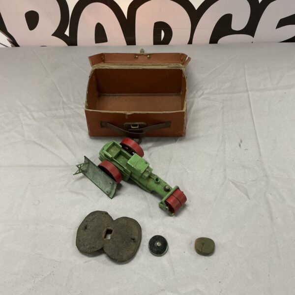 Vintage lead diecast roller vehicle with leather case.