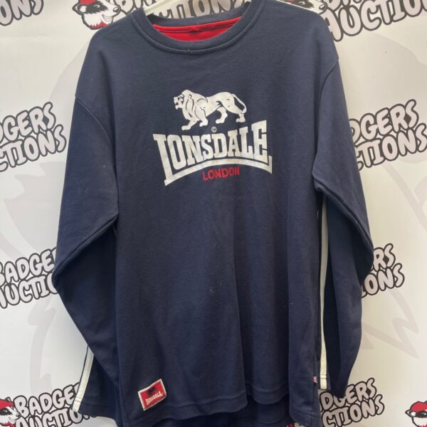 Vintage Lonsdale medium jersey with logo detail.