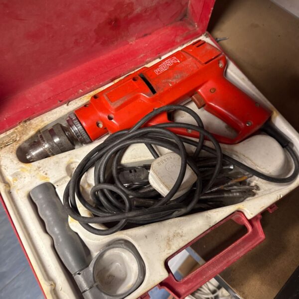 Vintage Perna drill model 9 in original case, classic power tool.