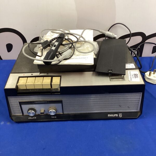 Vintage Philips portable cassette recorder with microphone and accessories.