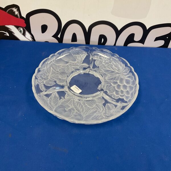 Vintage pressed glass serving dish with floral design.