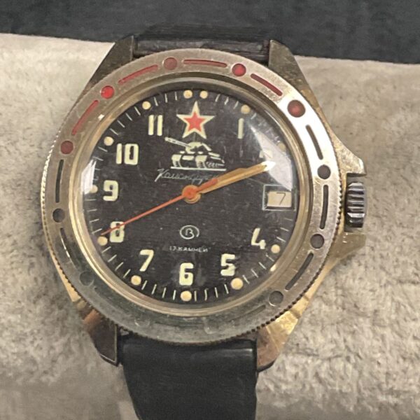 Close-up of vintage Russian tank watch dial and bezel.
